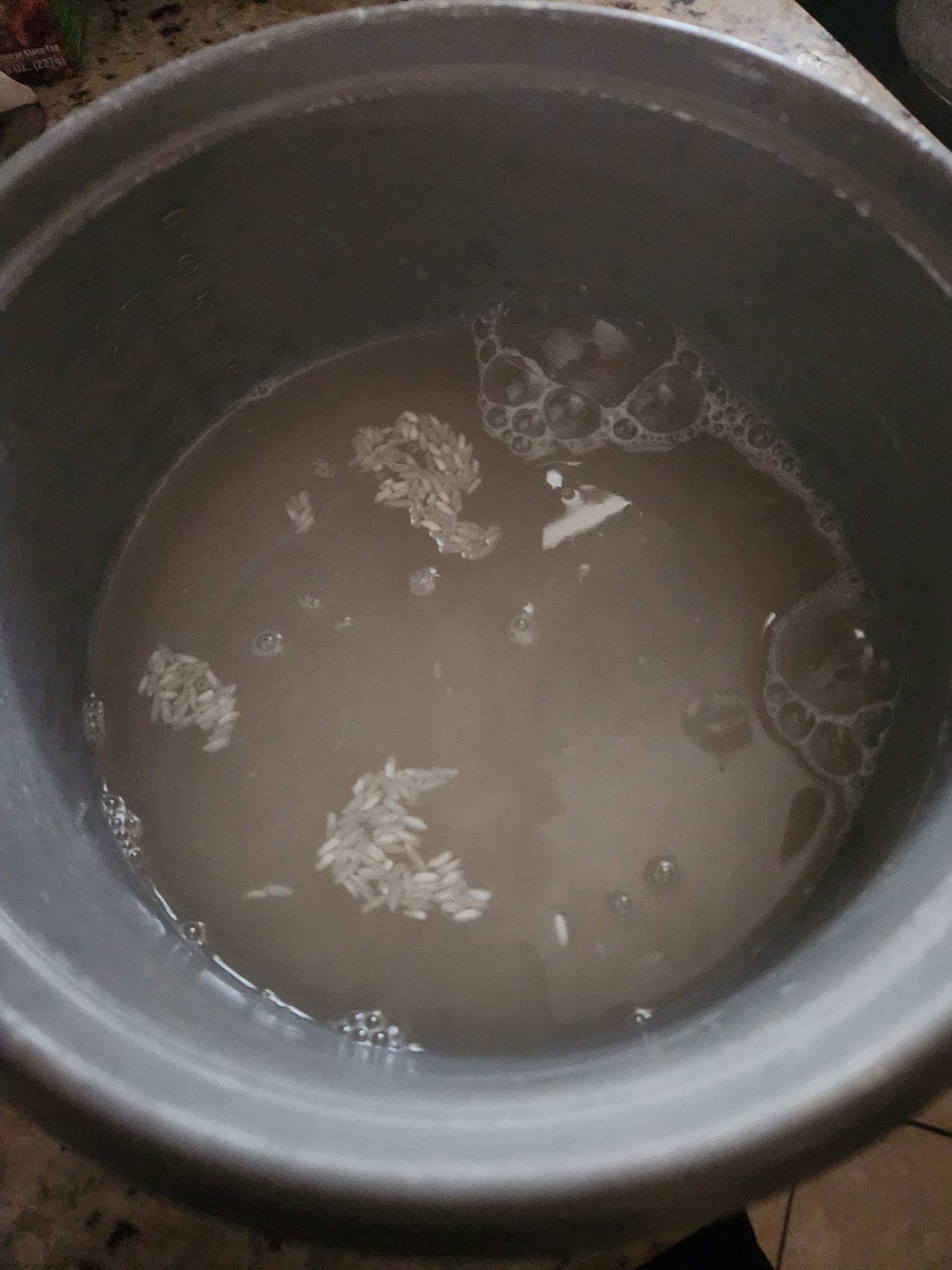 rice in pot with water